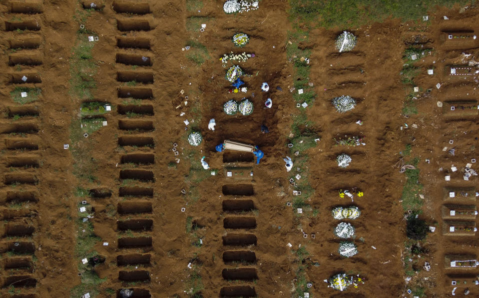 SAO PAULO, BRAZIL - April 1: An aerial view of Vila Formosa cemetery during a burial amidst the coronavirus (COVID-19) pandemic. (Photo by Miguel Schincariol/Getty Images)