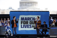 <p>Lin-Manuel Miranda, left, and Ben Platt perform ‘Found Tonight’ during the “March for Our Lives” rally in support of gun control, Saturday, March 24, 2018, in Washington. (AP Photo/Alex Brandon) </p>