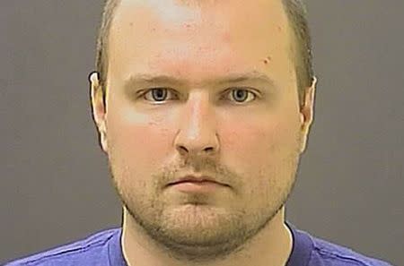 Officer Garrett E Miller is pictured in this undated booking photo provided by the Baltimore Police Department. REUTERS/Baltimore Police Department/Handout