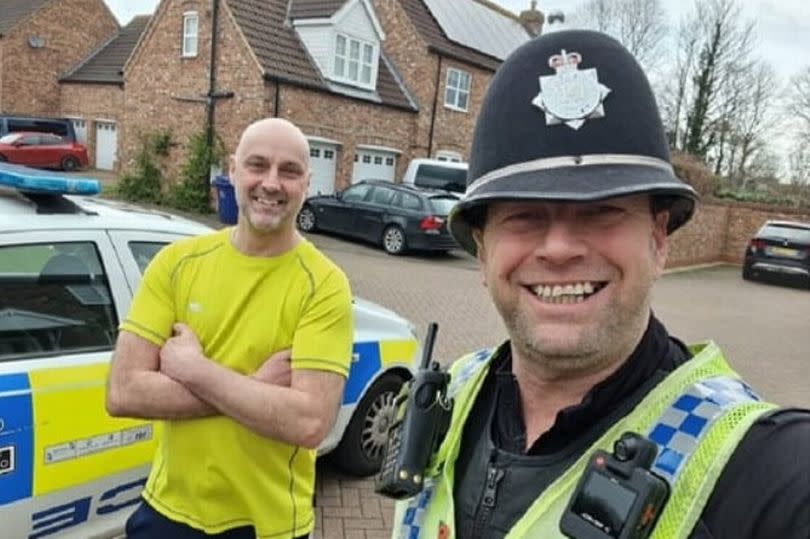 Chairman of New Waltham Parish Council, Dinsdale Shaw, with Humberside Police beat manager, PC David Cave