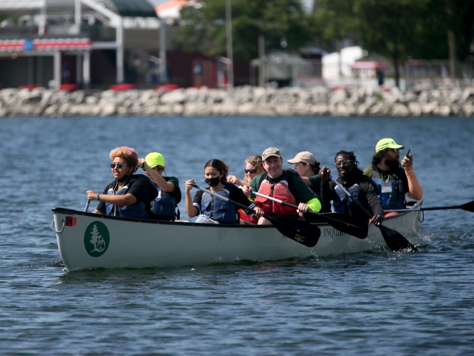 T Anderson, 14, takes lead on Monday near Harbor Drive along with fellow student from Escuela Verde school,  Jadmary Flores, 15, right, for the Wilderness Inquiry's Canoemobile.