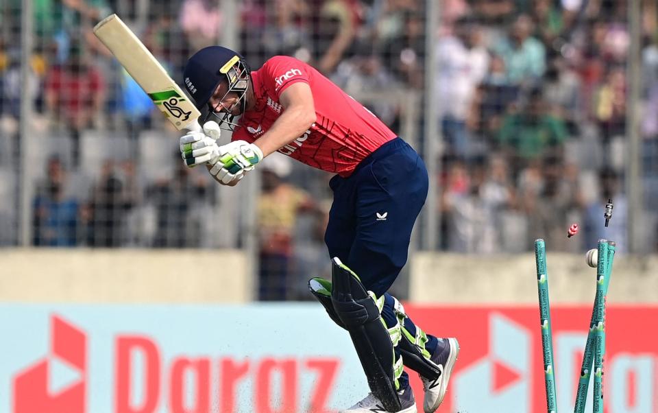 Jos Buttler is bowled by Hasan Mahmud - Munir Uz Zaman/AFP