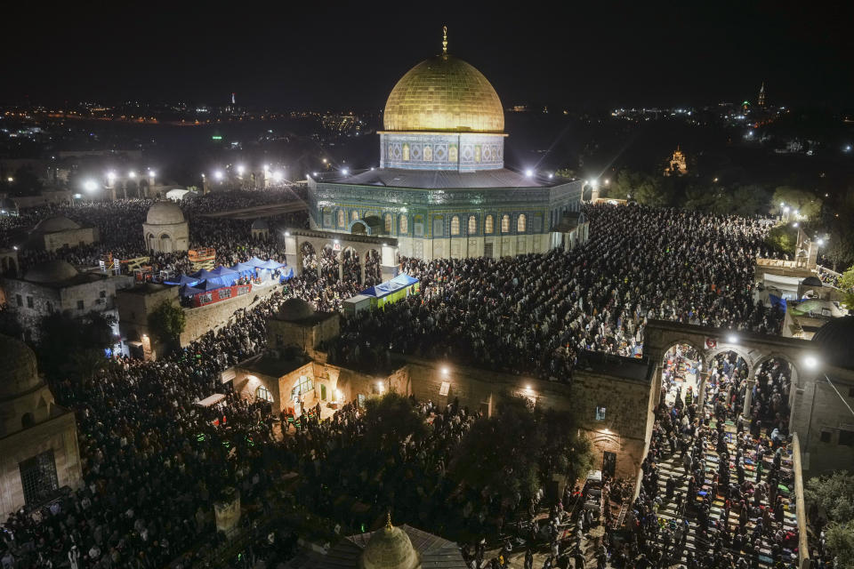 Palestinian Muslim worshippers pray during Laylat Al Qadr, also known as the Night of Destiny, in front of the Dome of the Rock, in the Al Aqsa Mosque compound in Jerusalem's Old City, Monday, April 17, 2023. Laylat Al Qadr is marked on the 27th day of the holy fasting month of Ramadan and is commemorated as the night Prophet Muhammad received the first revelation of the Quran. Muslims traditionally spend the night in prayer and devotion. (AP Photo/Mahmoud Illean)