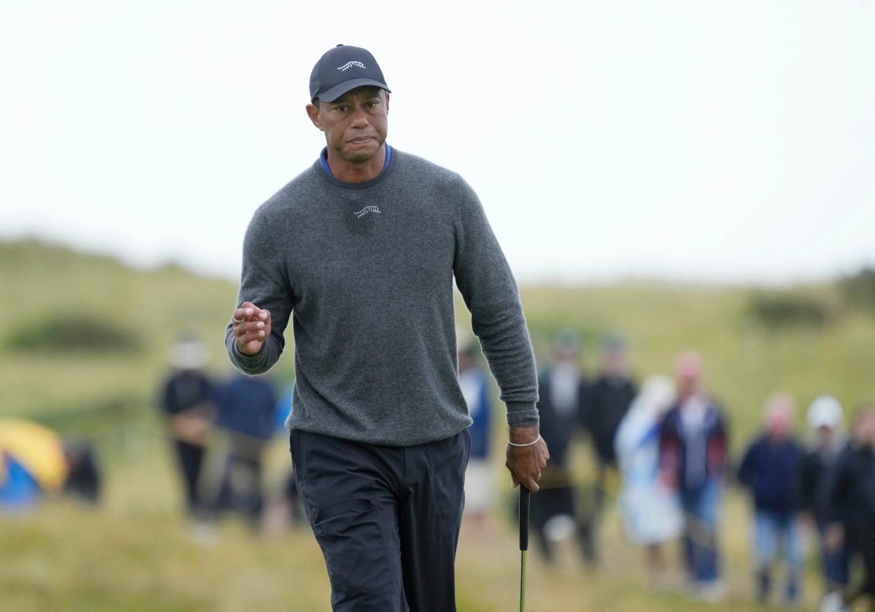 Jul 18, 2024; Ayrshire, SCT; Tiger Woods reacts after putting on the 13th green during the first round of the Open Championship golf tournament at Royal Troon. Mandatory Credit: Jack Gruber-USA TODAY Sports