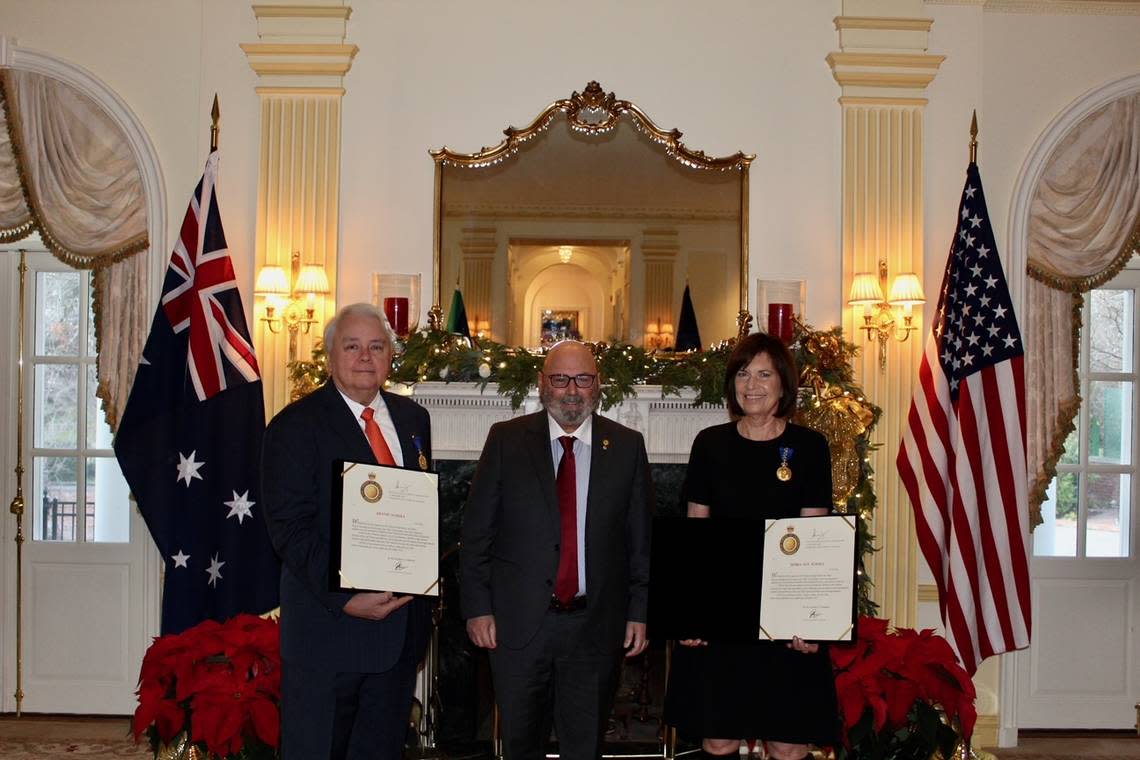 Australian Ambassador to the United States Arthur Sinodinos AO honored Miami arts leaders Dennis and Debra Scholl as Members of the Order of Austrailia for their efforts to collect, donate and promote contemporary aboriginal artwork.