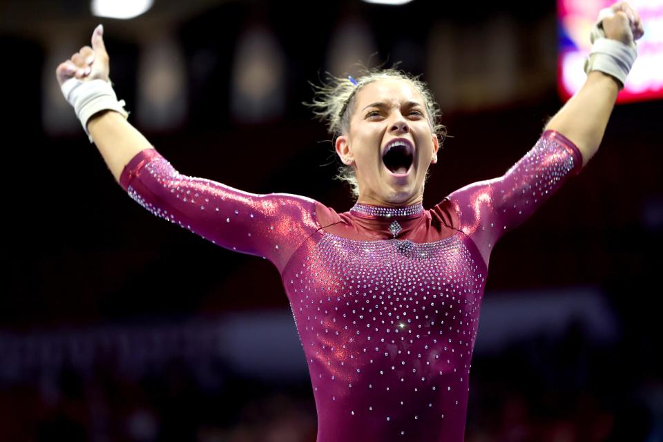 OU's Jordan Bowers celebrates a score of 10 on the vault during the Women's Big 12 Gymnastics Championship on Saturday at Lloyd Noble Center in Norman.