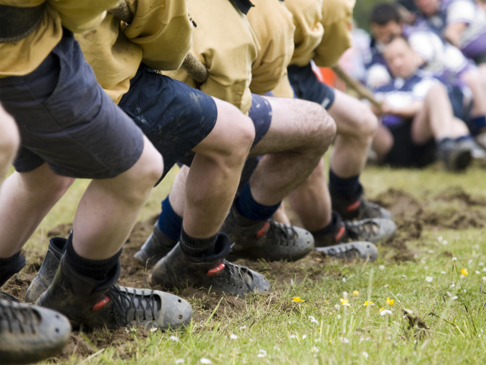 Two teams playing tug of war