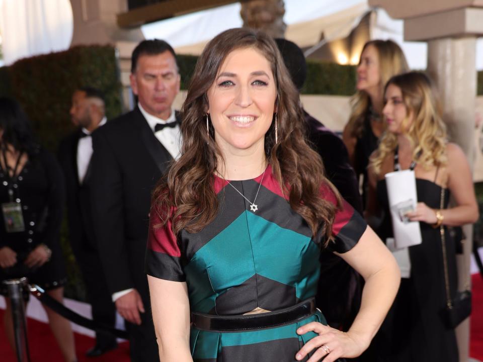 Mayim Bialik poses at an event