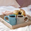 <p>Uncommon Goods</p><p><strong>$65.00</strong></p><p>Surprise your partner with breakfast and bed, these sweet mugs will make the perfect birthday or anniversary surprise. </p>