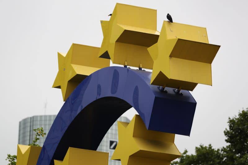 The headquarters of Germany's Deutsche Bank are photographed behind the Euro sign in Frankfurt, Germany, September 30, 2016. REUTERS/Kai Pfaffenbach