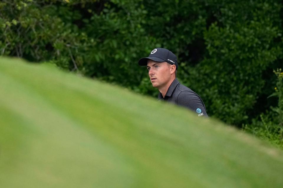 Jordan Spieth watches his chip to the green on the first hole Friday in his third-round match against Shane Lowry. Spieth, who hadn't looked comfortable all week, lost 2 and 1. Both golfers failed to get out of group play.
