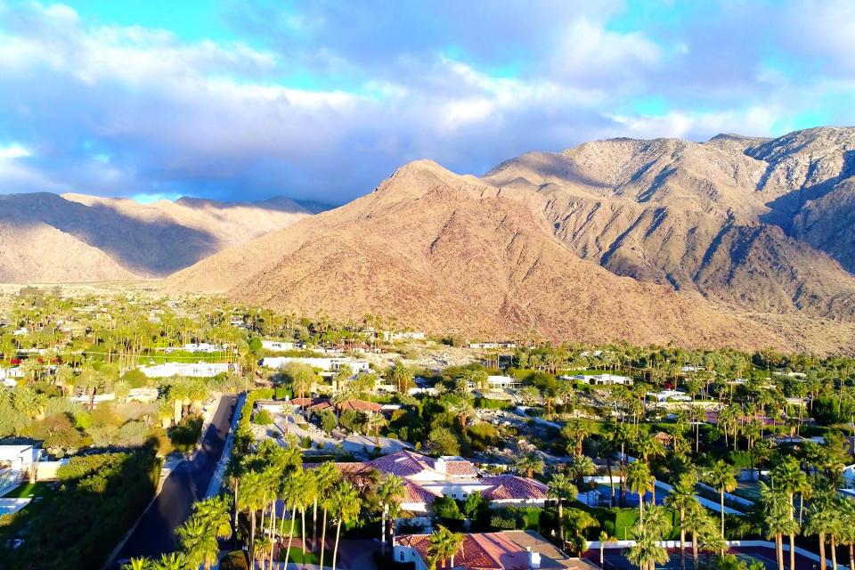 An aerian view of Palm Spring with the mountains in background