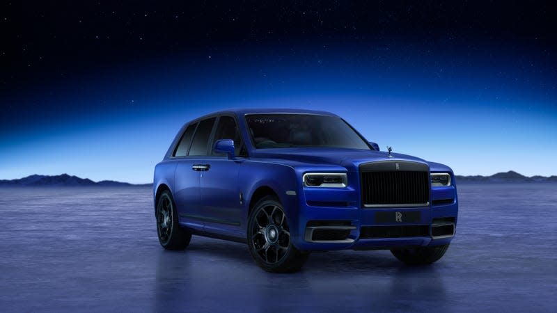 Front 3/4 view of a blue Rolls-Royce Cullinan