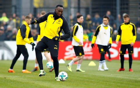 Usain Bolt participates in a training session with Borussia Dortmund  - Credit: REUTERS