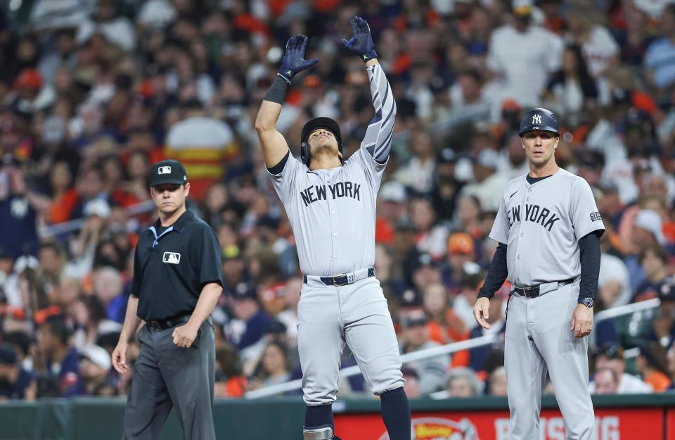 Mar 29, 2024; Houston, Texas, USA; New York Yankees right fielder Juan Soto (22) reacts after hitting a single during the third inning against the Houston Astros at Minute Maid Park. Mandatory Credit: Troy Taormina-USA TODAY Sports