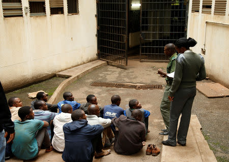 People arrested during protests wait to appear in the Magistrates court in Harare, Zimbabwe, January 16, 2019. REUTERS/Philimon Bulawayo