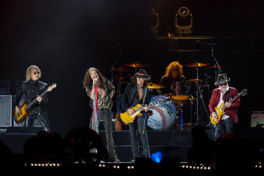 Tom Hamilton, from left, Steven Tyler, Joe Perry, John Douglas and Brad Whitford of Aerosmith, perform on Sept. 8, 2022, at Fenway Park in Boston. Aerosmith will be touring a city near you for the last time to celebrate their 50-plus years of being together. The Rock & Roll Hall of Fame band announced Monday, May 1, 2023 the dates for their farewell tour called “Peace Out” starting Sept. 2 in Philadelphia. (Photo by Winslow Townson/Invision/AP, file)