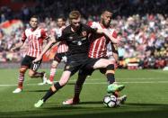 Britain Football Soccer - Southampton v Hull City - Premier League - St Mary's Stadium - 29/4/17 Hull City's Sam Clucas in action with Southampton's Ryan Bertrand Action Images via Reuters / Tony O'Brien Livepic