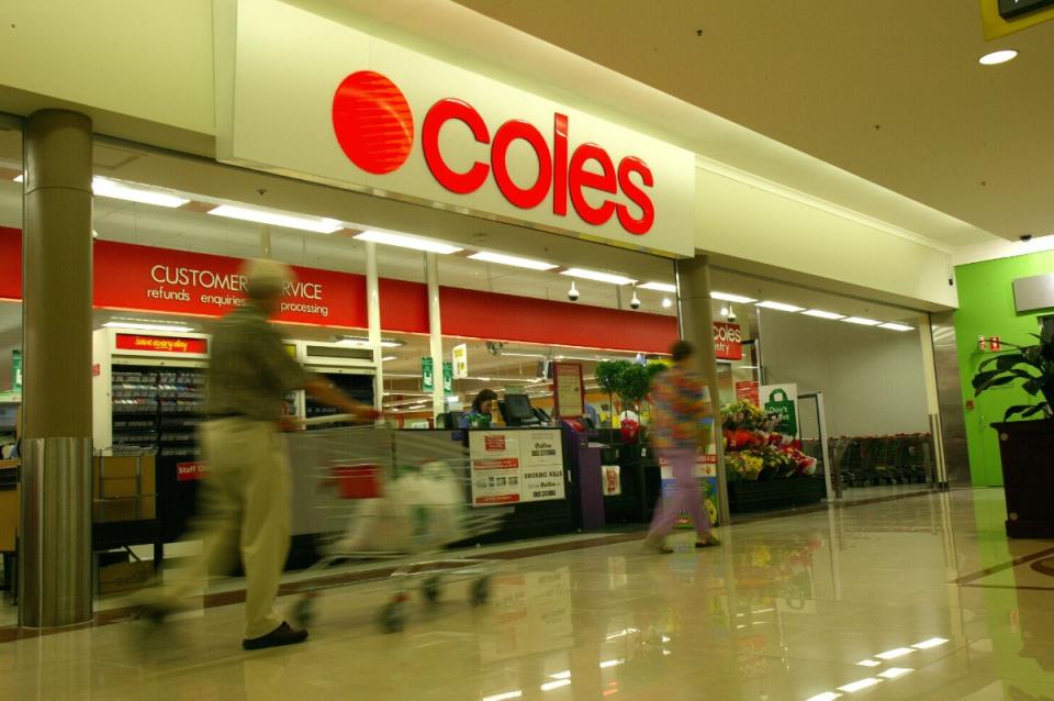 Shoppers at front of Coles supermarket