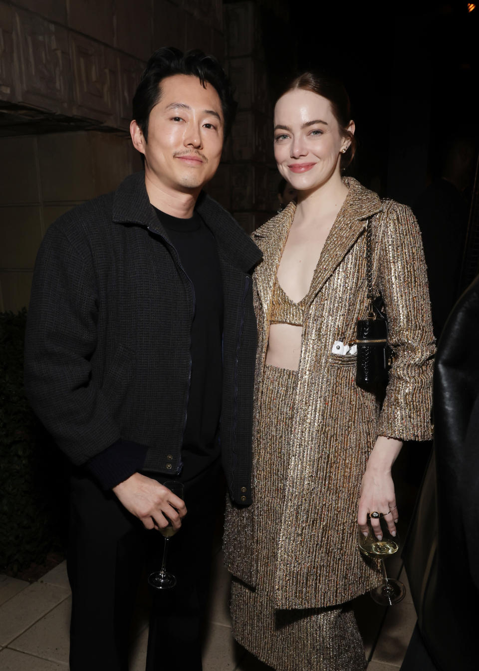 Steven Yeun and Emma Stone