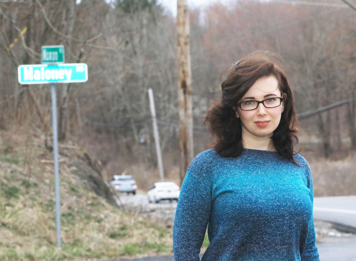 Lia-Marie Henry at the intersection of Maloney Road and Noxon Road in LaGrange on March 15, 2024. Henry was commuting from work in October and was rear ended by a Dutchess County Sheriff's deputy, which resulted in her car being totaled.