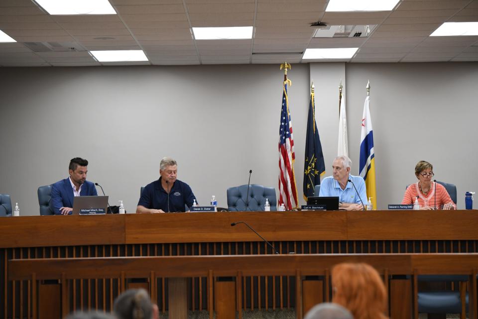 St. Joseph County attorney Mike Misch, left, and county commissioners Derek Dieter, Carl Baxmeyer and Deb Fleming (who has since left the commissioners) meet June 6, 2023.