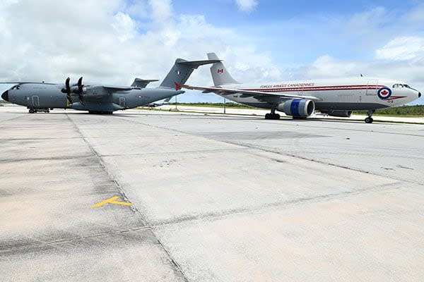 The two planes are seen on the tarmac in Guam after the incident. 