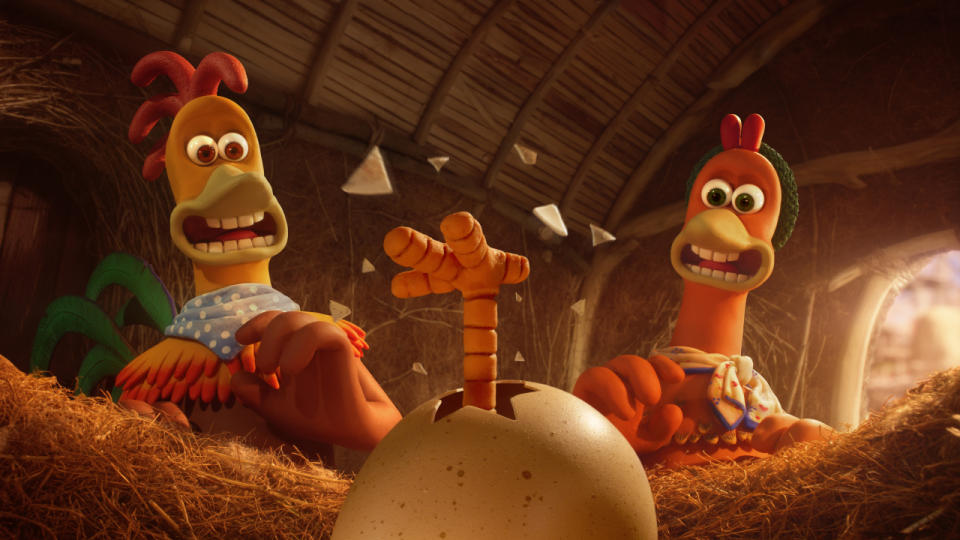 Rocky and Ginger watch an egg hatching in surprise in Chicken Run: Dawn of the Nugget.