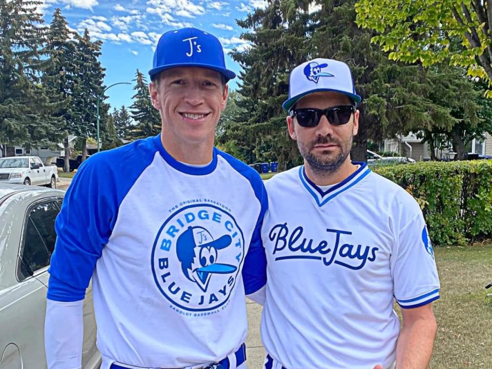 Craig Wilson (right) and a teammate pose in their Bridge City Blue Jays gear. (Submitted by Craig Wilson - Photo credit)