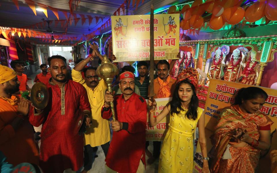 Hindu devotees celebrate the laying of the foundation stone  - SANJEEV GUPTA/EPA-EFE/Shutterstock