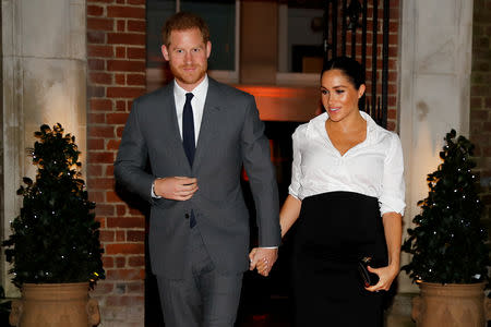 FILE PHOTO: Britain's Prince Harry and Meghan, Duchess of Sussex, arrive to attend the Endeavour Fund Awards in the Drapers' Hall in London, Britain February 7, 2019. Tolga Akmen/Pool via REUTERS/File Photo