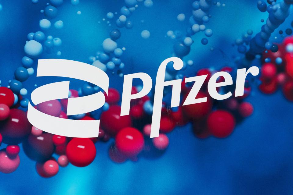 The Pfizer logo is displayed at the company's headquarters, Feb. 5, 2021, in New York. Sales of Pfizer’s COVID-19 vaccine and treatment pushed the drugmaker well past expectations in the first quarter, as profit grew 61%.