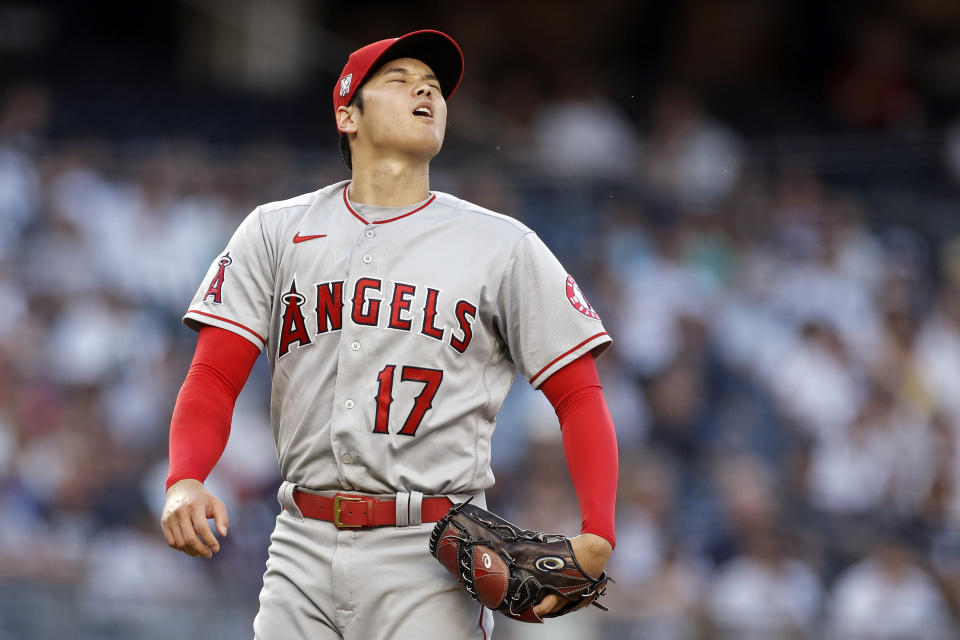 Los Angeles Angels pitcher Shohei Ohtani reacts during the first inning of the team's baseball game against the New York Yankees on Wednesday, June 30, 2021, in New York. (AP Photo/Adam Hunger)