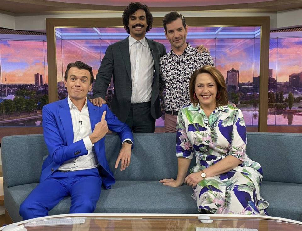 ABC News Breakfast hosts Michael Rowland, Tony Armstrong, Nate Byrne and Lisa Millar smiling on set 