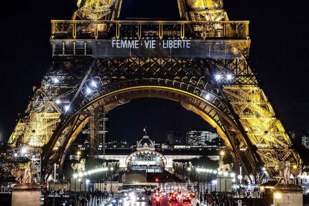 PHOTO: A photo shows the slogan 'Woman. Life. Freedom.' displayed on the Eiffel Tower in Paris in support of the Iranian people, in Paris, on Jan. 16, 2023. (Ludovic Marin/AFP via Getty Images)