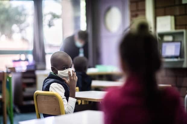 Elizabeth Middle School in Kindersley is moving to remote learning after a number of COVID-19 cases were discovered.  (Martin Bureau/AFP/Getty Images - image credit)