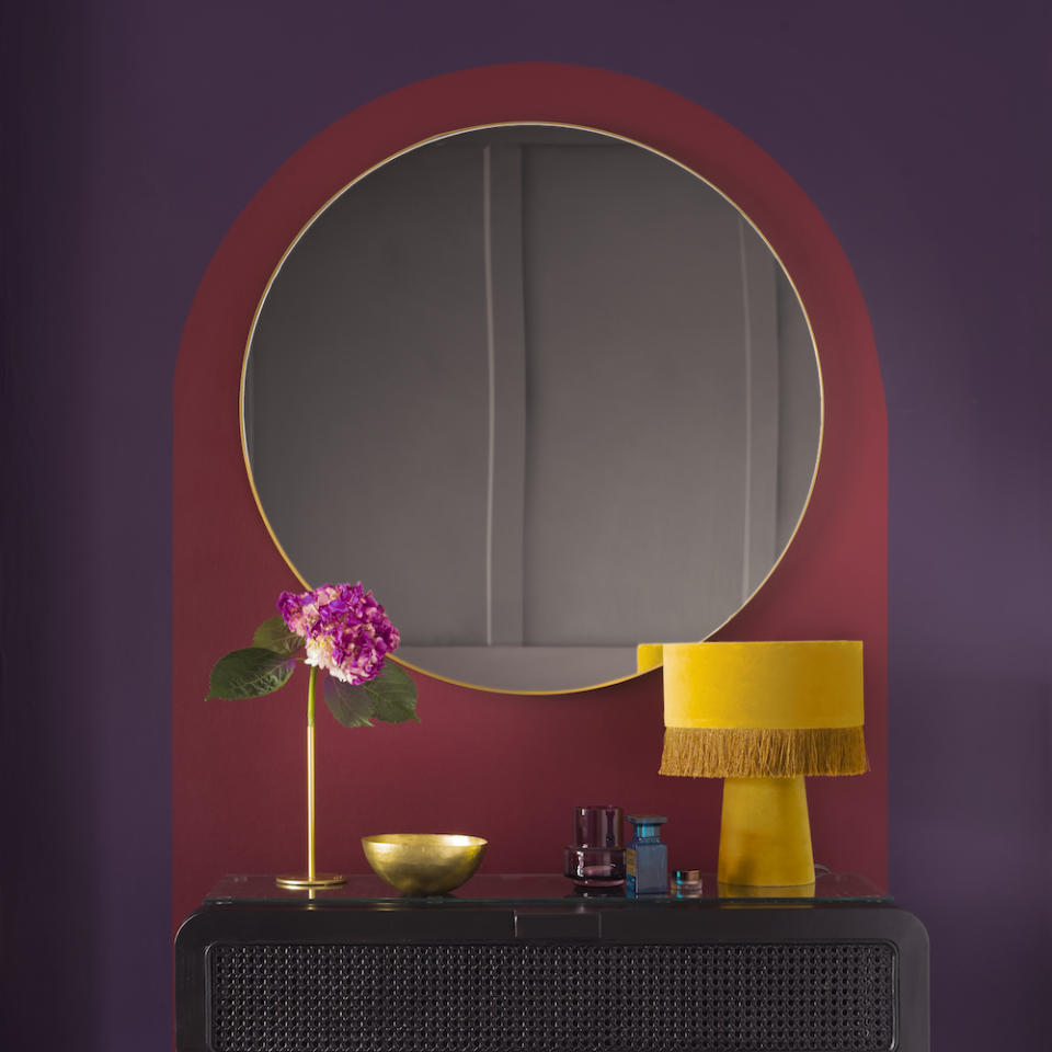 Frame a vanity area with a painted arch