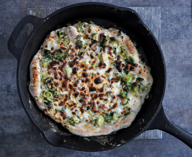 <strong>Get the <a href="http://www.howsweeteats.com/2013/02/cast-iron-skillet-brussels-sprouts-bacon-pizza/">Cast Iron Skillet Brussels Sprouts Bacon Pizza recipe from How Sweet It Is</a></strong>