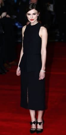 Actress Keira Knightley poses for photos at the European Premiere of "Jack Ryan: Shadow Recruit" in Leicester Square, central London January 20, 2014. REUTERS/Andrew Winning