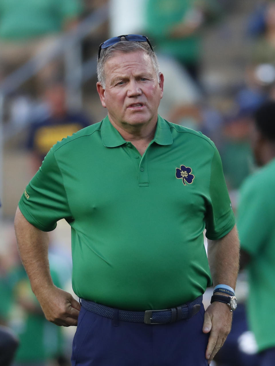 FILE - In this Saturday, Sept. 1, 2018, file photo, Notre Dame head coach Brian Kelly watches before an NCAA football game against Michigan in South Bend, Ind. For Notre Dame to book its second straight College Football Playoff appearance, it will have to run the table behind quarterback Ian Book. “When you step into being the quarterback at Notre Dame, high expectations come with it,” said head coach Brian Kelly, who has twice in nine seasons directed teams to 12-0 regular seasons only to come up short of delivering the school’s first national title since 1988. (AP Photo/Paul Sancya, File)