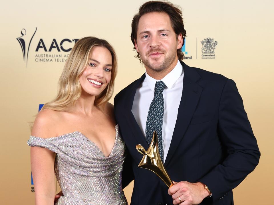 Margot Robbie and Tom Ackerley pose with the AACTA Trailblazer Award during the 2024 AACTA Awards Presented By Foxtel Group at HOTA (Home of the Arts) on February 10, 2024 in Gold Coast, Australia.