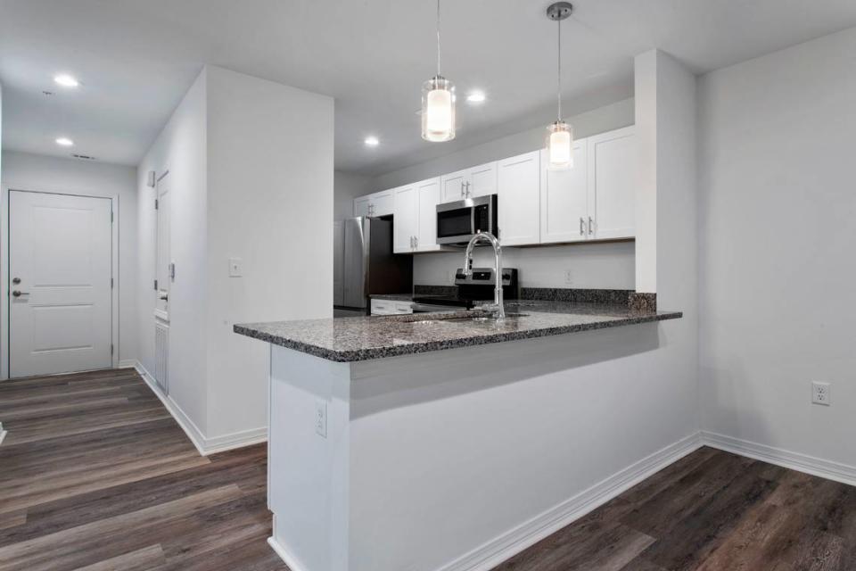 Kitchens at The Lofts are clean and modern, with high-end finishes.