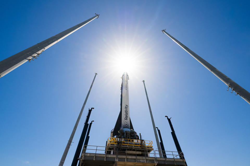 In this photo provided by Relativity Space, the company's Terran 1 rocket sits on a launch pad in Cape Canaveral, Fla., on Wednesday, March 22, 2023. About 85% of the structural mass of the rocket is manufactured with 3D printing technology, including its engines. (Relativity Space via AP)