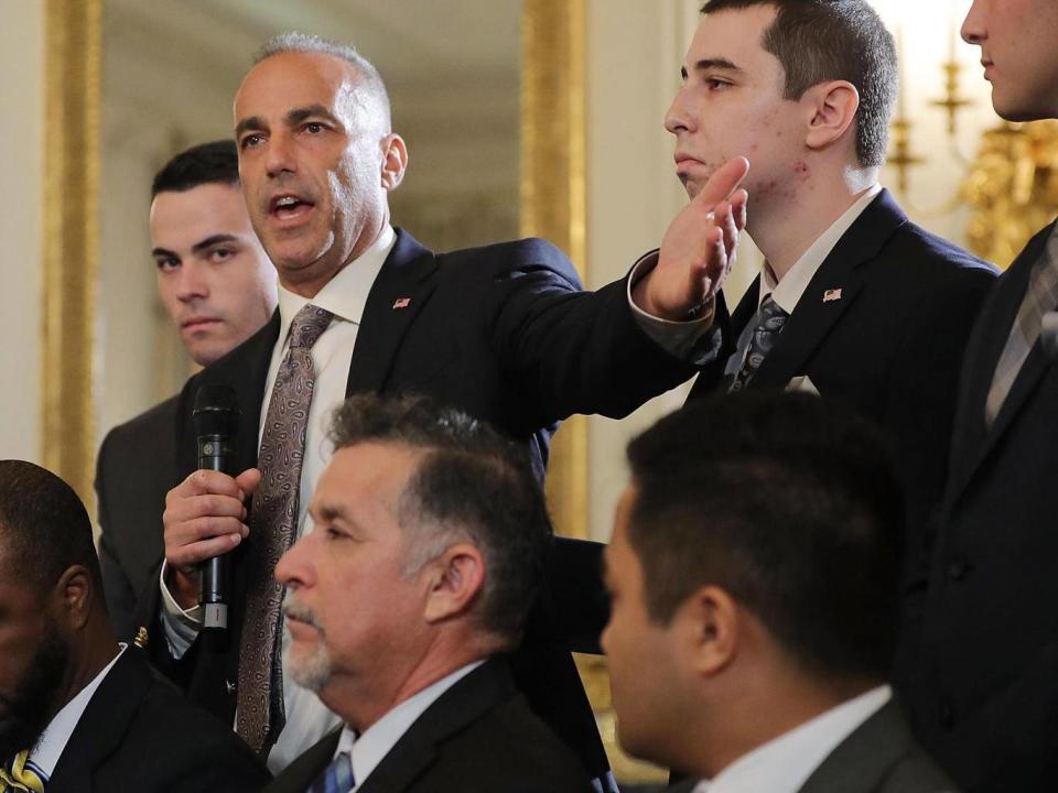 Andrew Pollack, whose daughter Meadow was killed in the Parkland shooting, is joined by his sons as he addresses a listening session with Donald Trump in the White House on Wednesday (Getty)