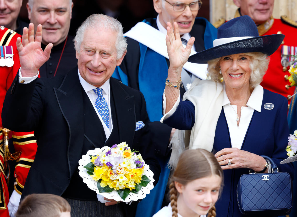 YORK, UNITED KINGDOM - APRIL 06: (EMBARGOED FOR PUBLICATION IN UK NEWSPAPERS UNTIL 24 HOURS AFTER CREATE DATE AND TIME) King Charles III (holding the traditional nosegay bouquet) and Camilla, Queen Consort attend the Royal Maundy Service at York Minster on April 6, 2023 in York, England. During the service His Majesty, for the first time since becoming Monarch and Supreme Governor of the Church of England, presented 74 men and 74 women (signifying the age of the Monarch) with Maundy Money to thank them for their work within the Church. Each recipient receives two purses, one red and one white. The white purse contains a set of specially minted silver Maundy coins equivalent in value to the age of the Monarch. The red purse contains two commemorative coins symbolising the Sovereign's historic gift of food and clothing. (Photo by Max Mumby/Indigo/Getty Images)