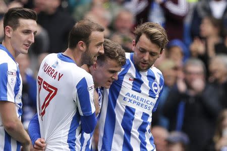 Britain Football Soccer - Brighton & Hove Albion v Wigan Athletic - Sky Bet Championship - The American Express Community Stadium - 17/4/17 Solly March of Brighton and Hove Albion celebrates with team mates after scoring their second goal. Action Images / Henry Browne Livepic