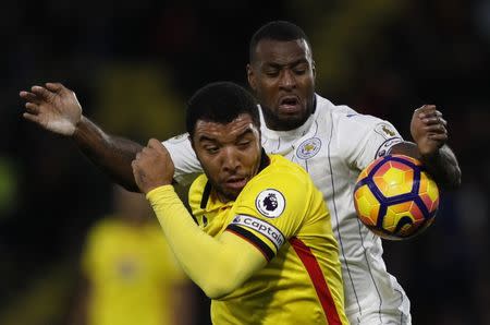 Britain Football Soccer - Watford v Leicester City - Premier League - Vicarage Road - 19/11/16 Leicester City's Wes Morgan in action with Watford's Troy Deeney Reuters / Darren Staples Livepic