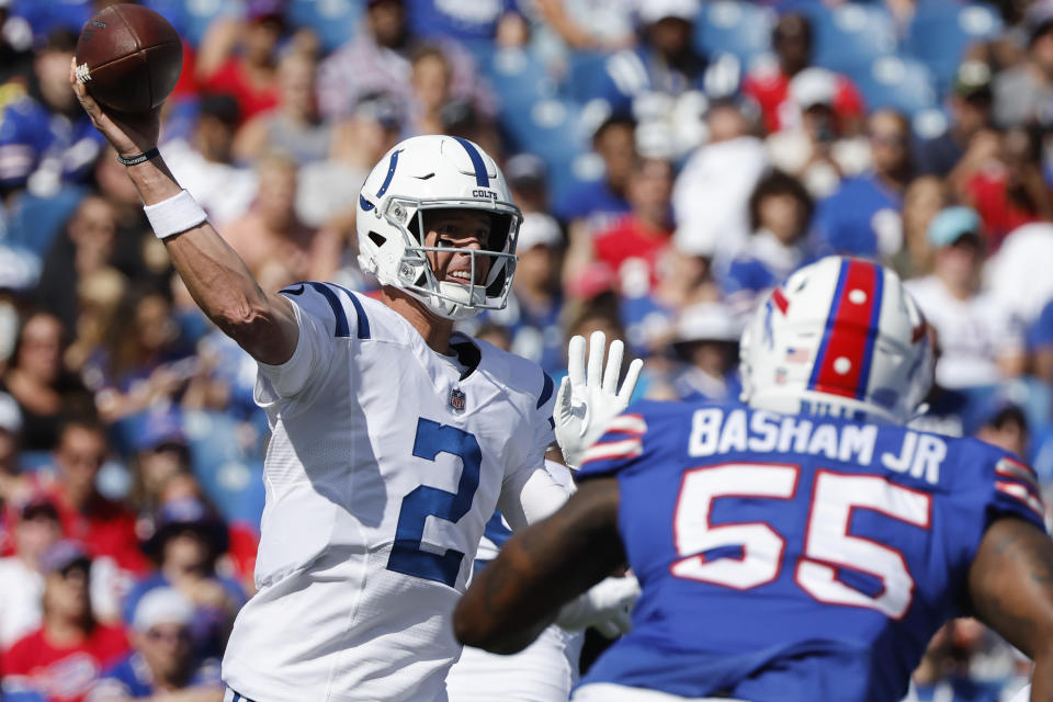 Indianapolis Colts quarterback Matt Ryan (2) passes under pressure from Buffalo Bills defensive end Boogie Basham (55) during the first half of a preseason NFL football game, Saturday, Aug. 13, 2022, in Orchard Park, N.Y. (AP Photo/Jeffrey T. Barnes)