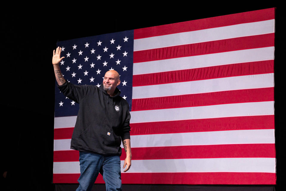 Pennsylvania Democratic Senatorial candidate John Fetterman waves as he arrives onstage at a watch party during the midterm elections at Stage AE in Pittsburgh, Pa., on Nov. 8, 2022.<span class="copyright">Angela Weiss—AFP/Getty Images</span>