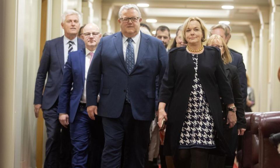 Judith Collins walks with the National party’s new deputy leader, Gerry Brownlee, after a vote at parliament in Wellington.